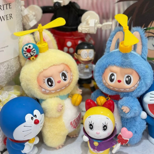 Collection of cartoon character plush toys with a blurred background